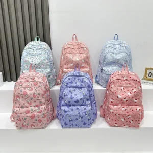MINISO Sanrio kids school backpack featuring a cute pink and purple Kuromi and Cinnamoroll cartoon print design.