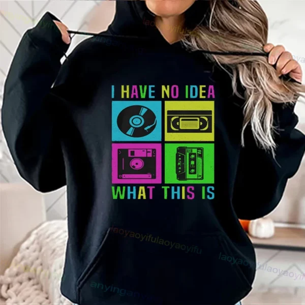 Woman wearing a vibrant neon hoodie with 'Take Me Back To The 90's' graphic print