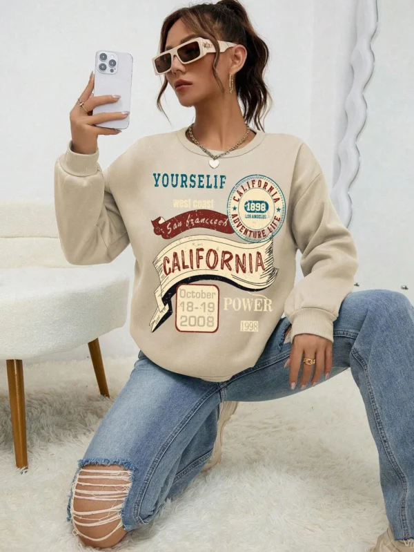Women's loose fit fleece-lined hoodie sweatshirt with 'California Yourself' letter print on the front.