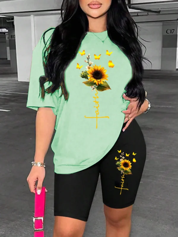 Woman modeling sunflower butterfly print two piece set with short sleeve knit t-shirt and regular fit shorts.