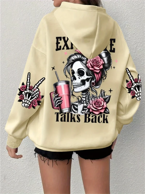 Woman wearing the warm grey fleece pullover hoodie with the funny 'Expensive Talks Back' print on the front.
