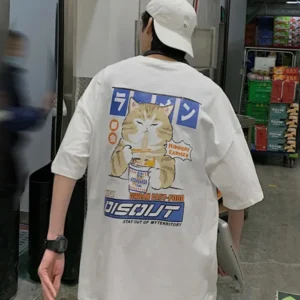 White oversized t-shirt with a cartoon graphic of a cute cat happily eating noodles from a bowl