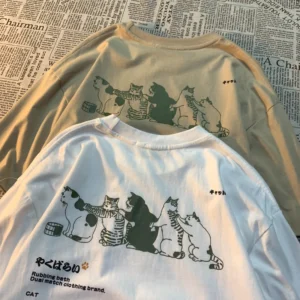 Women's loose fit t-shirt featuring a funny cartoon cat print