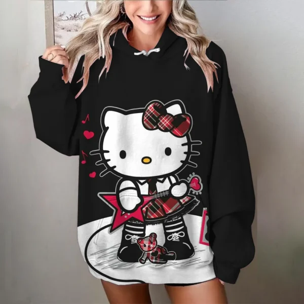 Women's black and white oversized Hello Kitty sweatshirt with long sleeves. Y2K style loose fit pullover top.