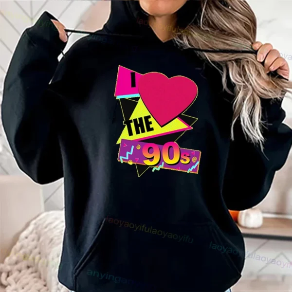 Woman wearing a vibrant neon hoodie with 'Take Me Back To The 90's' graphic print