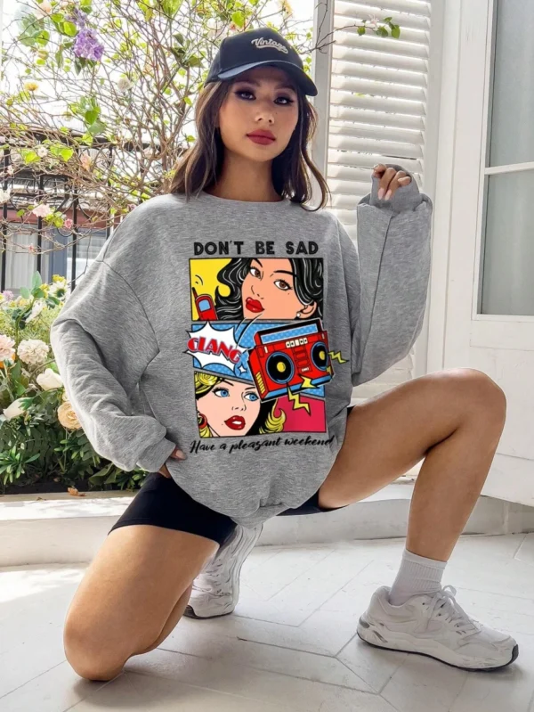 Women's casual warm fleece sweatshirt with a cartoon graphic print.