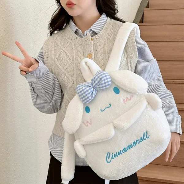 Front view of the MINISO plush backpack featuring cute Kuromi and Cinnamoroll Sanrio characters.