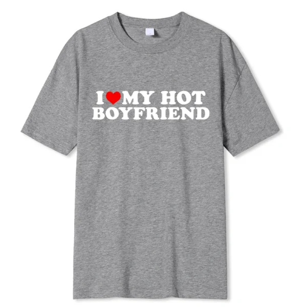 Person wearing funny black graphic tee with white 'I Love My Hot Girlfriend/Boyfriend' text print.