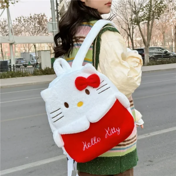 Front view of the MINISO plush backpack featuring cute Kuromi and Cinnamoroll Sanrio characters.