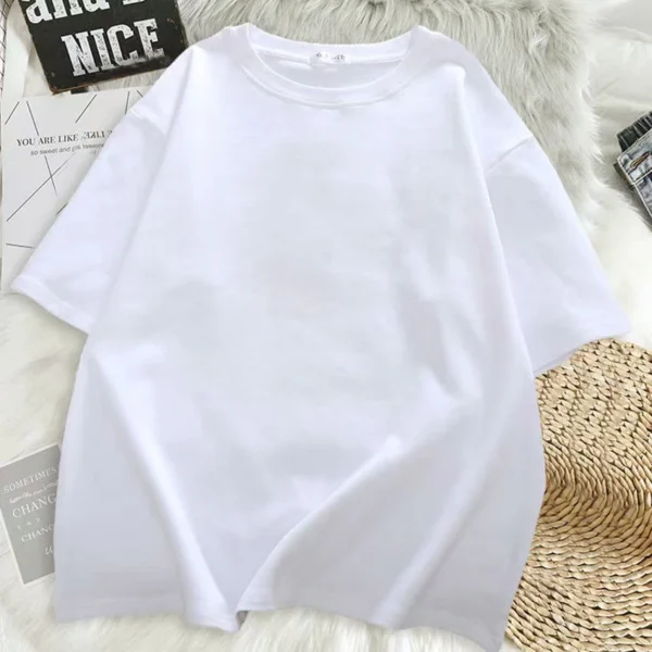 Women's short sleeve crew neck t-shirt with a colourful Kawaii style graphic print featuring a girl and sneakers motif. ```