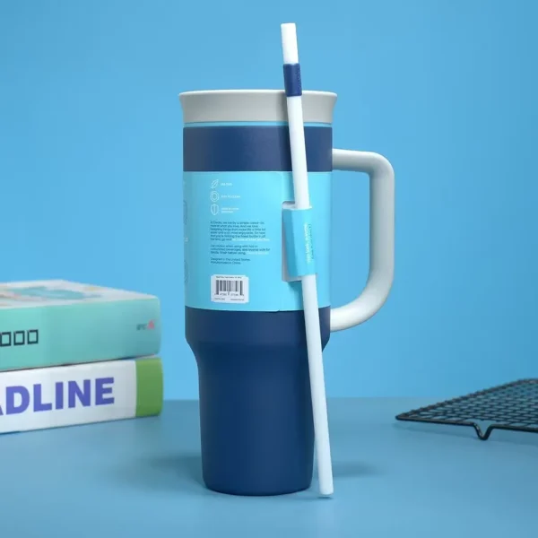Owala Free Sip 40 oz stainless steel water bottle with straw lid.