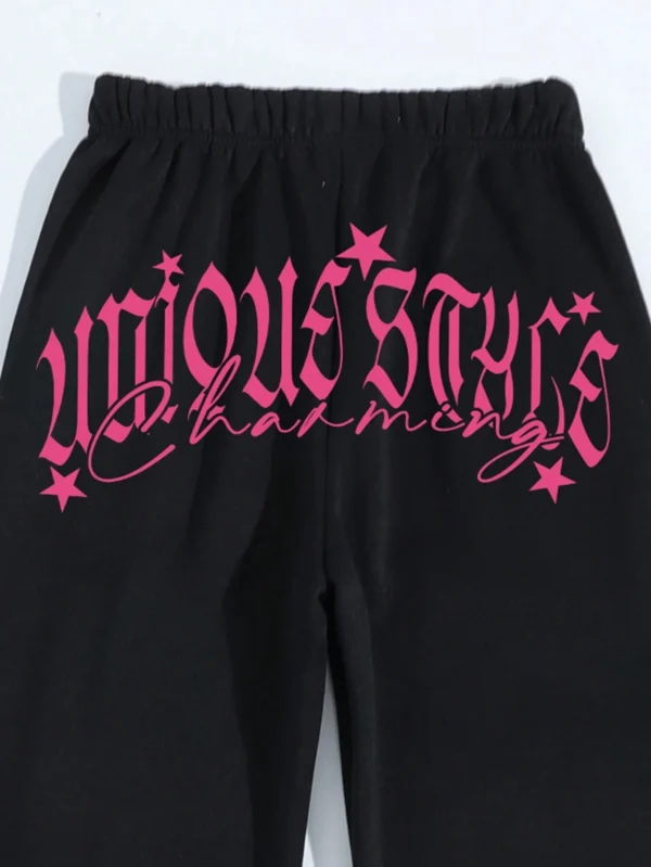Women's pink loose casual hip hop pants with white letter print graphic - streetwear style trousers for autumn/winter.