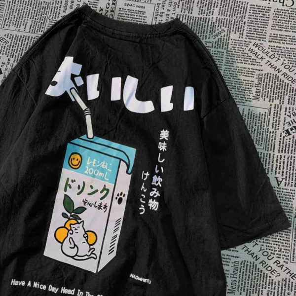 Oversized cotton t-shirt with a Japanese cat print graphic on the front