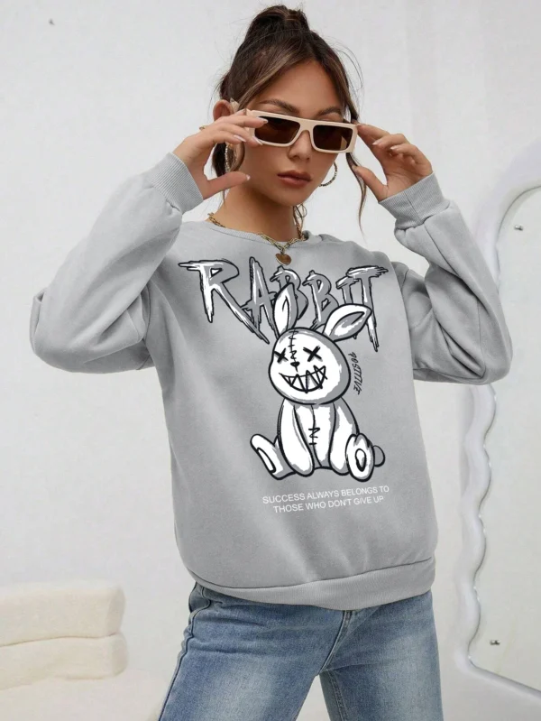 Grey fleece hoodie for women featuring a quirky white laughing rabbit print on the front
