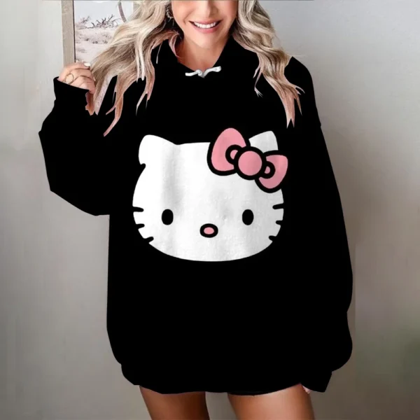 Women's black and white oversized Hello Kitty sweatshirt with long sleeves. Y2K style loose fit pullover top.