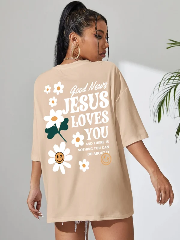 Woman wearing comfortable O-neck "Jesus Loves You" Christian graphic t-shirt for summer against a plain background.