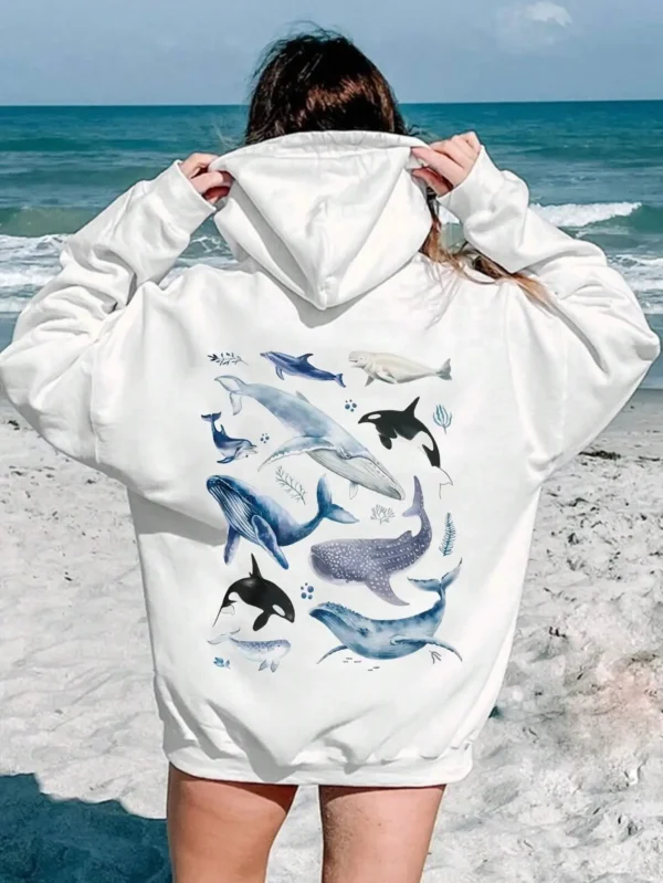 Woman wearing a comfortable blue pullover hoodie featuring a large