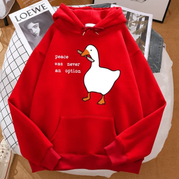 Man wearing black oversized hoodie with white 'Peace Was Never An Option' graphic text print centred on the chest.
