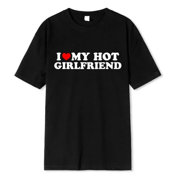 Person wearing funny black graphic tee with white 'I Love My Hot Girlfriend/Boyfriend' text print.