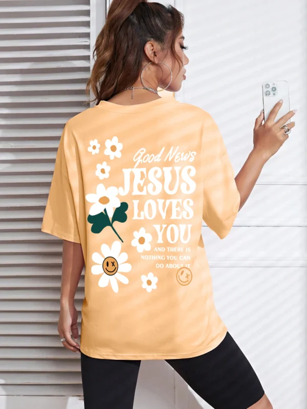 Woman wearing comfortable O-neck "Jesus Loves You" Christian graphic t-shirt for summer against a plain background.