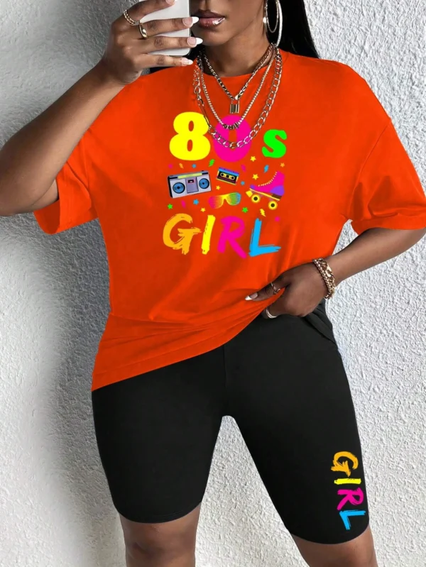 Woman wearing colorful 80s print t-shirt and matching casual shorts two-piece set.