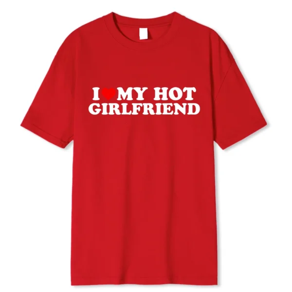 Person wearing funny black graphic tee with white 'I Love My Hot Girlfriend/Boyfriend' text print.