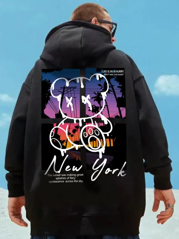 Men's black streetwear hoodie featuring a graphic print of a cool cartoon bear on the front. Pullover style with kangaroo pocket.