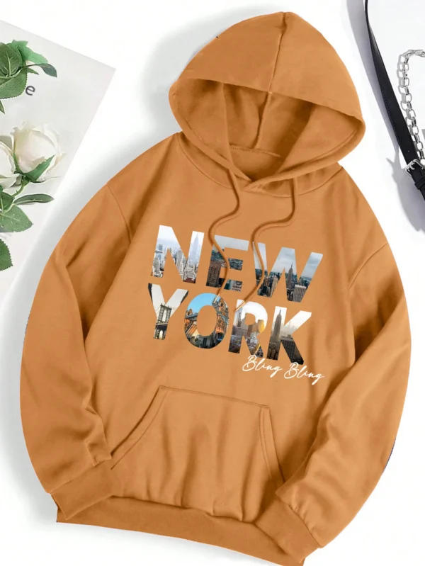 Oversized grey hoodie for women featuring a detailed New York City scenery print and cozy artificial fur lining.