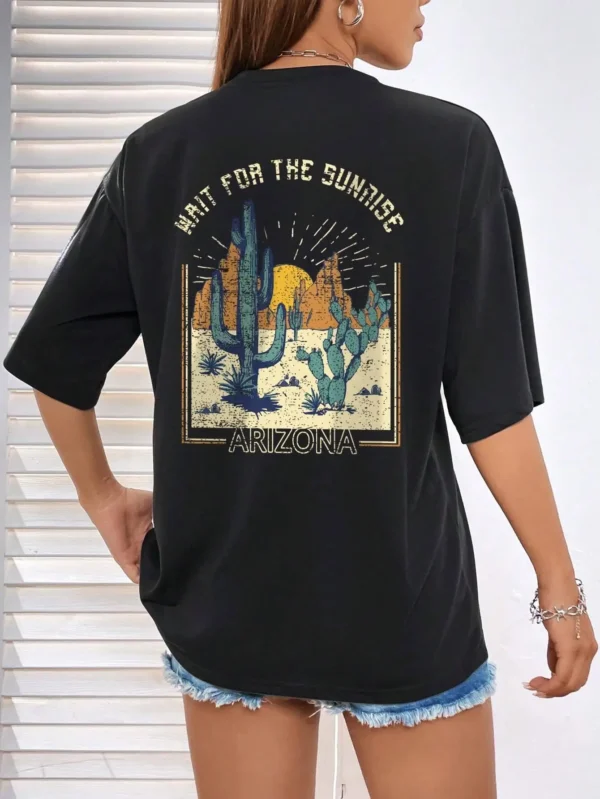 Front view of the women's soft cotton "Wait For The Sunrise" graphic tee in a relaxed fit.