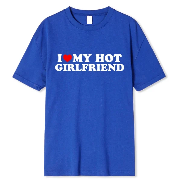 Person wearing funny black graphic tee with white 'I Love My Hot Girlfriend/Boyfriend' text print.