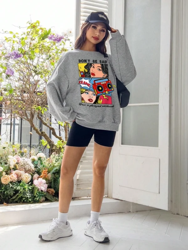 Women's casual warm fleece sweatshirt with a cartoon graphic print.