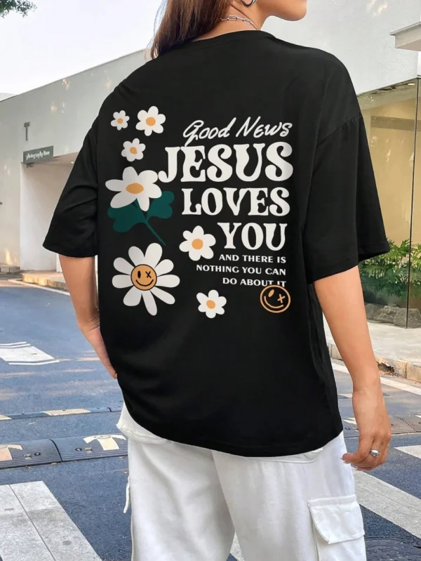 Woman wearing comfortable O-neck "Jesus Loves You" Christian graphic t-shirt for summer against a plain background.