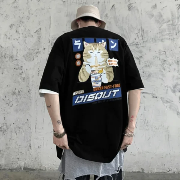 White oversized t-shirt with a cartoon graphic of a cute cat happily eating noodles from a bowl