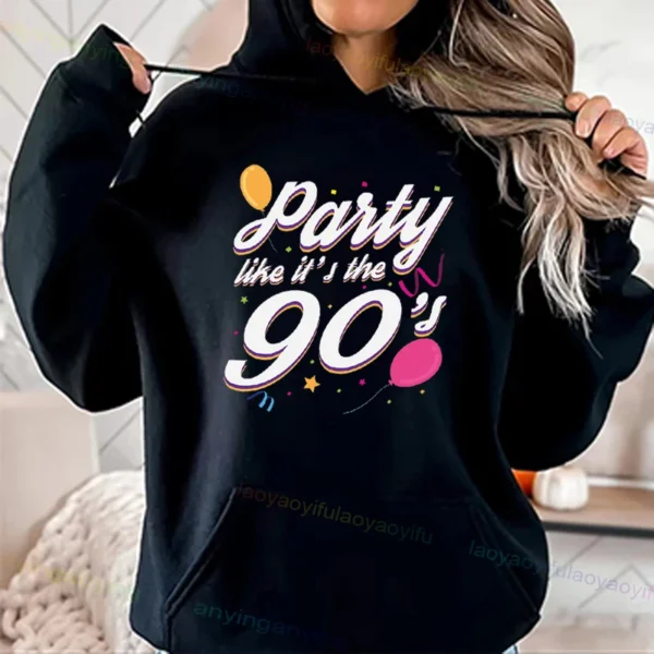 Woman wearing a vibrant neon hoodie with 'Take Me Back To The 90's' graphic print