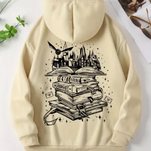Woman wearing a cozy grey pullover hoodie with a humorous book-themed print on the front