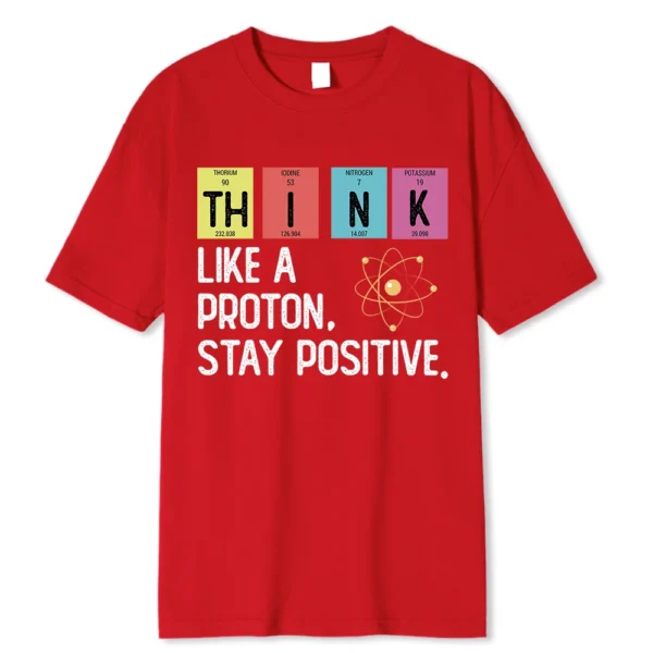 Cotton t-shirt printed with the black text slogan "Think Like A Proton Stay Positive" - representing a funny science pun design.