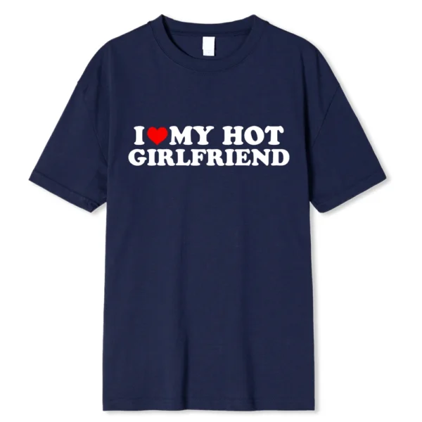 Person wearing funny black graphic tee with white 'I Love My Hot Girlfriend/Boyfriend' text print.