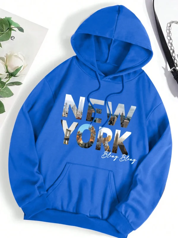 Oversized grey hoodie for women featuring a detailed New York City scenery print and cozy artificial fur lining.