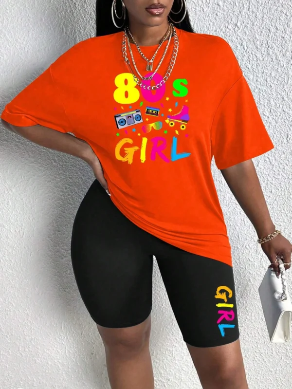 Woman wearing colorful 80s print t-shirt and matching casual shorts two-piece set.