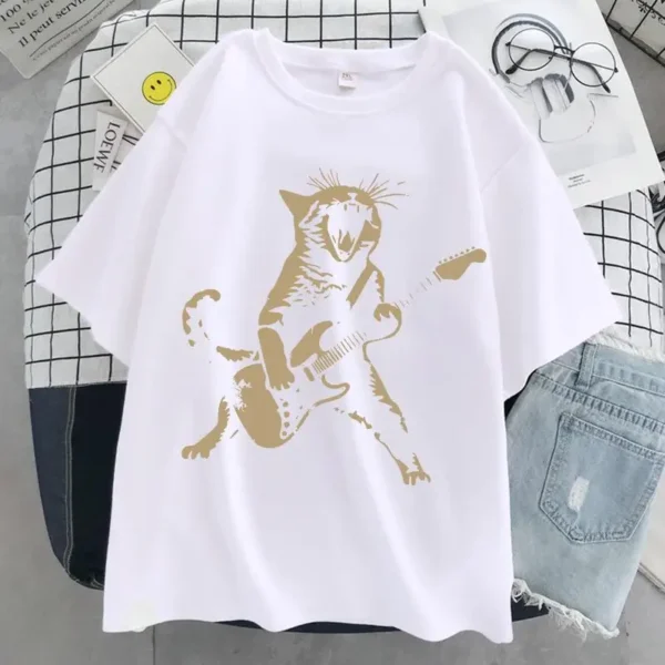 Woman wearing a funny cat playing guitar t-shirt.