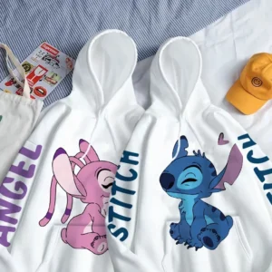 Disney hoodie featuring cute cartoon graphic of Stitch and Angel. Unisex pullover style with front pocket.