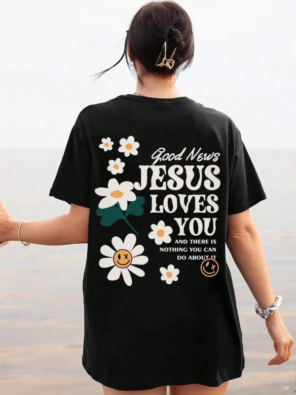 Woman wearing comfortable O-neck "Jesus Loves You" Christian graphic t-shirt for summer against a plain background.
