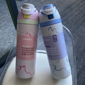 Owala Free Sip insulated stainless steel water bottle with Free Sip lid.