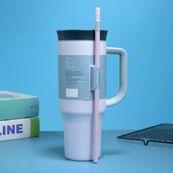 Owala Free Sip 40 oz stainless steel water bottle with straw lid.