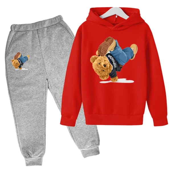 Child wearing fun cartoon bear print hooded tracksuit set with matching pants