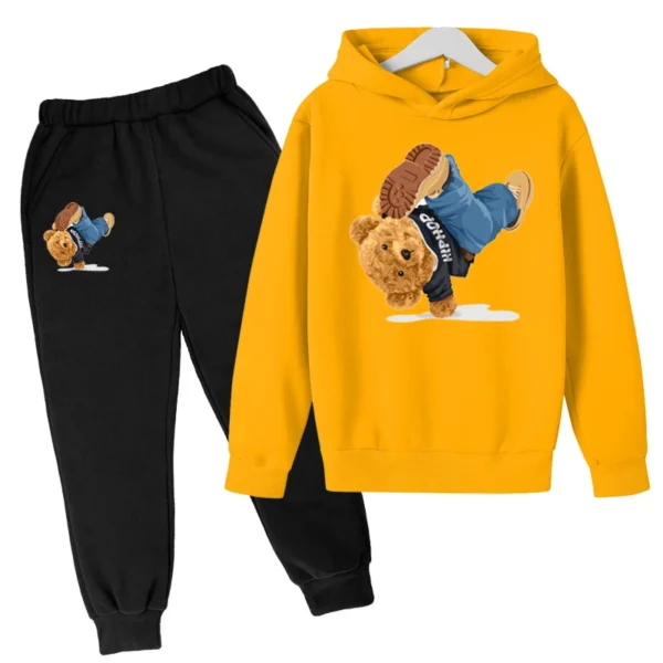 Child wearing fun cartoon bear print hooded tracksuit set with matching pants