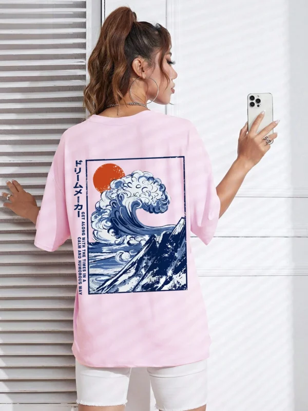 Women's cotton t-shirt featuring a vibrant Japanese wave and sunset graphic print. Relaxed fit.
