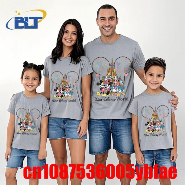 and child wearing matching white cotton t-shirts with colorful Mickey and Friends print for Disney World trip.