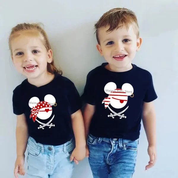 Family in matching funny Disney pirate shirts with Mickey and Minnie ears design for vacation.