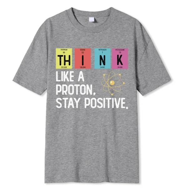 Cotton t-shirt printed with the black text slogan "Think Like A Proton Stay Positive" - representing a funny science pun design.